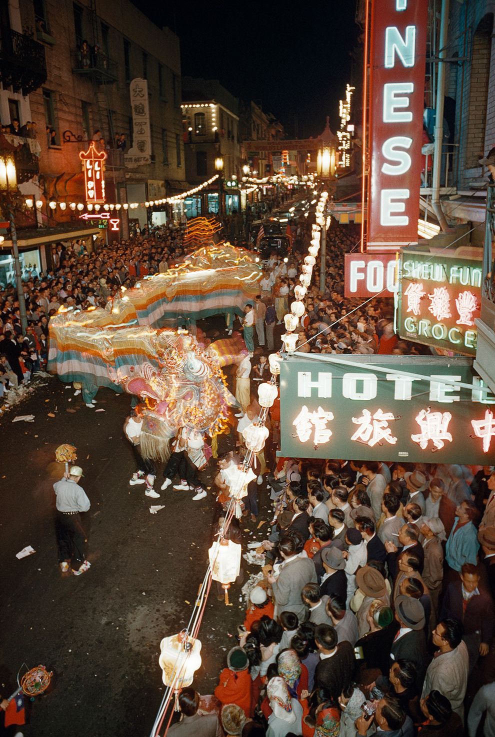 Night parade with dragon dance through Chinatown